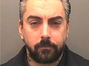 Supporting image for story: Disgraced rock star Ian Watkins died from stab wound to the neck, inquest hears