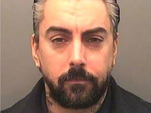 Supporting image for story: Disgraced rock star Ian Watkins died from stab wound to the neck, inquest hears