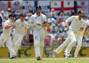 Australia's Nathan Lyon (right) celebrates after England's Ben Stokes (left) was caught behind by Australia's Brad Haddin (not pictured) on 120 runs