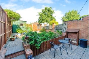 Outside there's a patio area and a rear garden