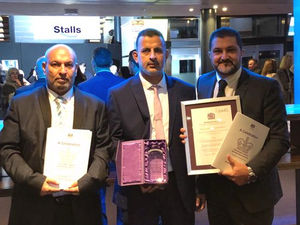 Supporting image for story: Migrant aid group collect Queen's Award