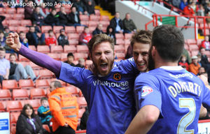 Wolves' James Henry gives his side a 1-0 lead.