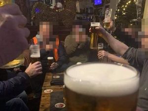 Supporting image for story: Men pictured drinking pints at seaside hotel with caption ‘What Lockdown?’