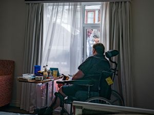 Supporting image for story: Relief as rule change allows outdoor family visits for care home residents