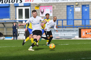Kyle Storer (AFC Telford United Midfielder) takes the penalty and finds the back of the net