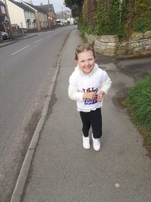 Libby New, aged 5, running to raise money for the NHS