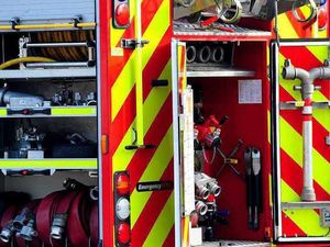 Supporting image for story: Crews tackle early morning garage fire