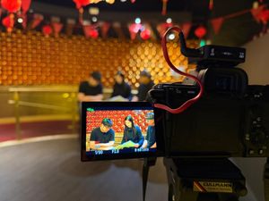 Chi Lam, Polly Yiu & Vy-Liam Ng being filmed