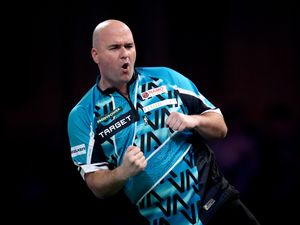 Rob Cross celebrating