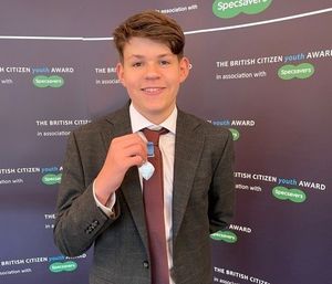  Sam Gascoyne showing off his medal