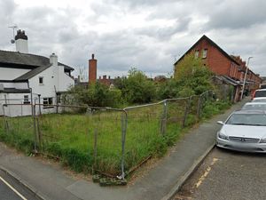 Attempts to build houses on the former home of Jones & Hughes Monumental Masons stone merchants on Salop Road in Oswestry have been ongoing since 2010. Photo: Google
