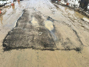 A big pothole resulted in four vehicles getting stuck in one day. Picture: Sharon Oertel