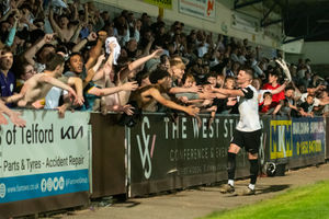 Jordan Piggott celebrates with Bucks fans (Kieren Griffin)