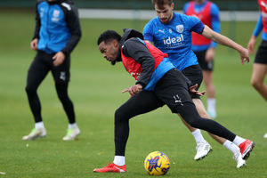 Grady Diangana gets the better of Jayson Molumby (Photo by Adam Fradgley/West Bromwich Albion FC via Getty Images).