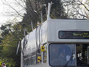 Supporting image for story: Bus' top deck is sliced off