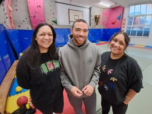 Reel Grappling founder Kelvin with session beneficiaries Sangeeta (left) and Nabkiran (right)