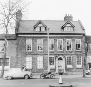 A car and motorbike are parked outside Stafford's William Salt Library in this picture taken in February 1962. 