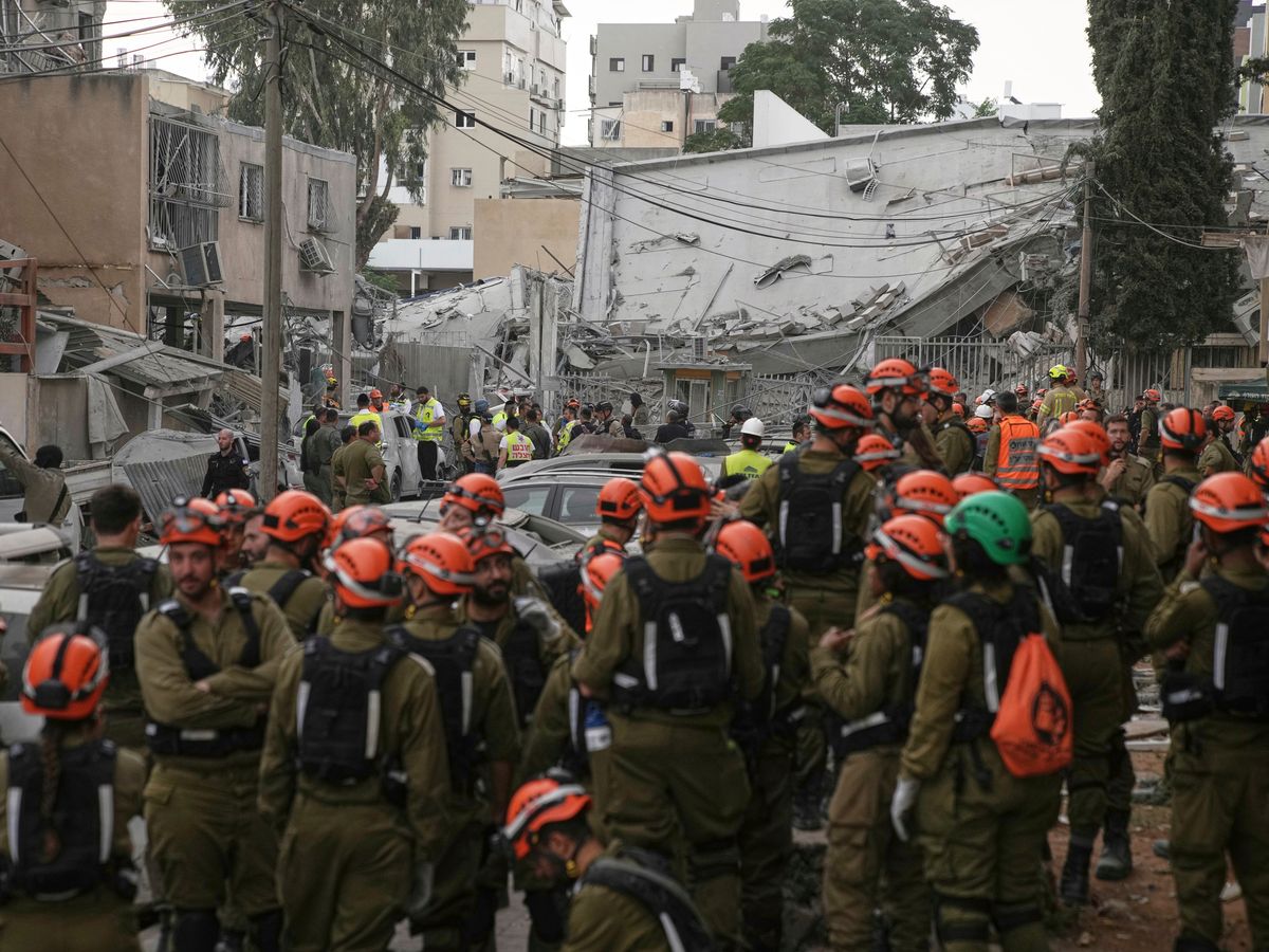 Iran renews missile attacks on Israel, killing five and wounding dozens