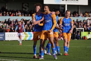 Tom Sang of Shrewsbury Town celebrates with Tommy McDermott after scoring to make it 3-0