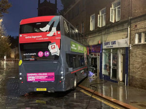 The bus crash in October 2021 left the shop severely damaged