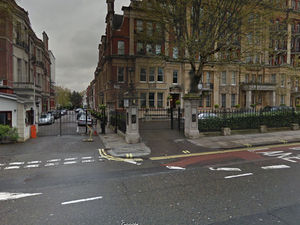 Supporting image for story: Two charged after man attacked having burnt Koran outside Turkish consulate