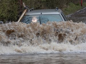 Supporting image for story: Inventive West Midlands dad turns car into amphibious vehicle by fitting 5ft snorkel