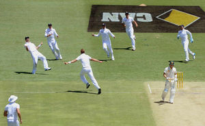 England's Stuart Broad (fourth left) celebrates taking the wicket of Australia's Michael Clarke (second right)