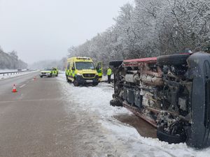 Supporting image for story: Car overturns on M54 as snow falls on motorway