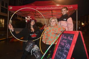 Performer, Nula with Connie Ainsworth, 4, and Amelia Ainsworth, 9 at Shifnal's Christmas lights switch-on