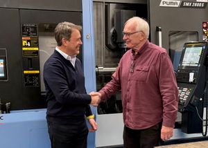 Craig Wright, Chairman and CEO of Wright Industries, with Michael Burrows, Managing Director of Burcas Limited, following the completion of the acquisition.