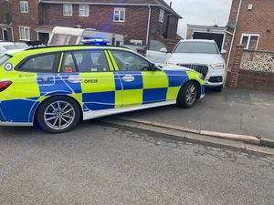 The stolen Audi Q3 and the police car after the driver attempted to ram his way out