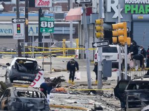 Investigators working at the scene after a small plane crashed in Philadelphia