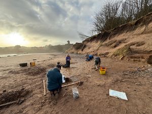 Supporting image for story: 2,000-year-old footprints discovered on beach after storms