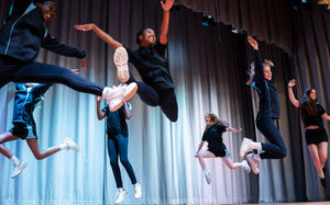 Girls' High jumps for joy