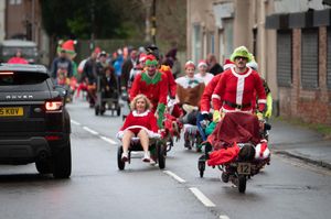 Supporting image for story: Charity wins in Wem as townsfolk take part in annual wheelbarrow race