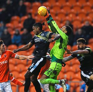 Omar Beckles came back in to the three-man central defence (AMA)