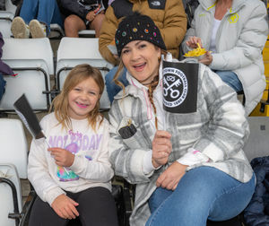 7-year-old Siena D’Angelo and her mother cheered on their team all through the match. Credit: Jim Wall