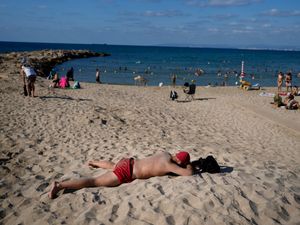 Supporting image for story: Life goes on as region teeters on the edge of all-out war