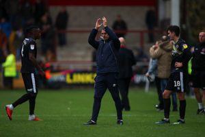 A dejected Askey applauds the fans at full time. (AMA)