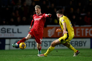 Taylor Perry of Shrewsbury Town and Ryan Sweeney of Burton Albion (AMA)