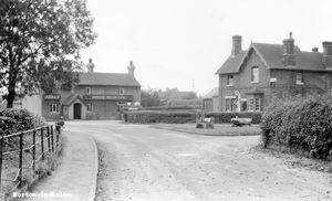 Norton-in-Hales village. This picture was shared by David Francis, who said: 'Postcard photograph, circa 1958, of Norton in Hales showing the Hinds Head Inn, shop, post office and garage workshop attached. The shop and garage, owned at one time by Bill Marshall, shows a petrol pump and a Cleveland petrol sign. By the road sign the Bradling stone can be seen. This was a glacial deposit from the Ice Age known as an erratic. Legend has it that if anyone was found working after midday on Shrove Tuesday they would be taken to the Bradling stone and either beaten, bumped or rolled on the stone or bradled. The word 'bradled' is mentioned in Wright's Dialect Dictionary of 1898 as meaning 'beat'. Another school of thought is that the stone marked a Parish boundary and on the occasion of Beating The Bounds younger members of the community would be 'bumped' on the stone so that they would remember the Parish boundary. I wonder if the little boy on the left of the picture is waiting for his father to come out of the pub!'