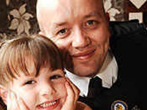 Supporting image for story: Pc to be godfather of young accident girl