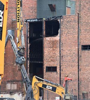 There is now a large hole in the side of the building 