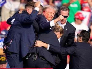 Supporting image for story: Donald Trump rushed off stage after gunshots at Pennsylvania rally