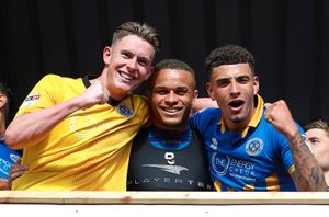 Dean Henderson, Carlton Morris and Ben Godfrey of Shrewsbury Town celebrate winning the game. (AMA)