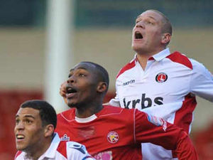 Supporting image for story: Walsall defender Manny Smith salutes Andy Butler as captain is left on bench