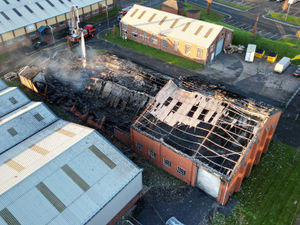 Supporting image for story: New photos show extensive fire damage to Pensnett firm's building after early morning blaze