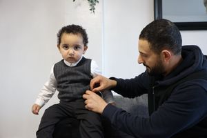 Sam with his father Nadeem Alshameri at home in Birmingham.