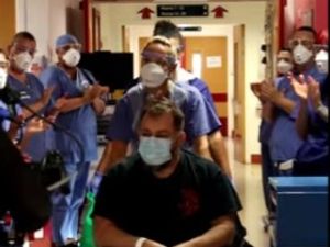 Supporting image for story: WATCH: Applause as paramedic leaves Russells Hall Hospital after coronavirus fight