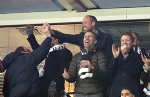 The Prince of Wales (centre) celebrates during the UEFA Champions League quarter-final, second leg match at Villa Park, Birmingham. Picture date: Tuesday April 15, 2025.